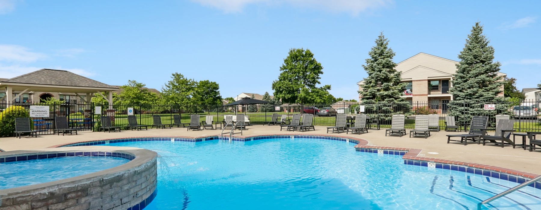 pool with black furniture