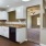 a kitchen with white cabinets