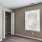 a room with a window and a door