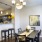 a kitchen with a dining table and chairs