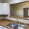 a kitchen with white cabinets
