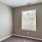 a room with a window and a door