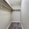 a hallway with a light on the ceiling