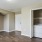 a kitchen with white cabinets